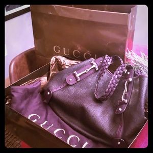 Brown leather Gucci purse in MINT conditionconditi